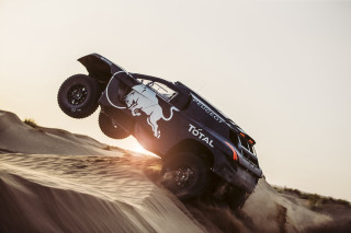 Truck jumping sand dune desert - a truck free wallpaper