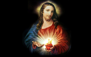 Jesus holding heart glowing light - the dark background free wallpaper