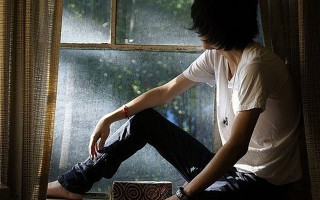 Man sitting window sill looking 2 - arthur pan free wallpaper