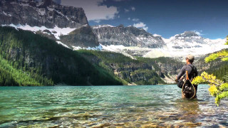 Man standing lake bicycle mountains - the top free wallpaper