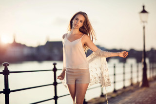 Woman shorts white top fence - short shorts free wallpaper