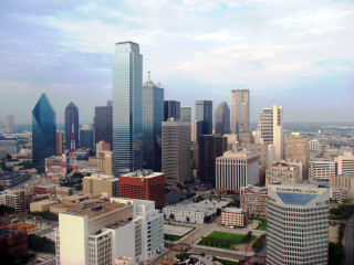 City skyline green field clouds - cleve gray free wallpaper