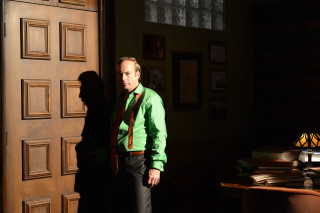 Man standing door green shirt - holography free wallpaper