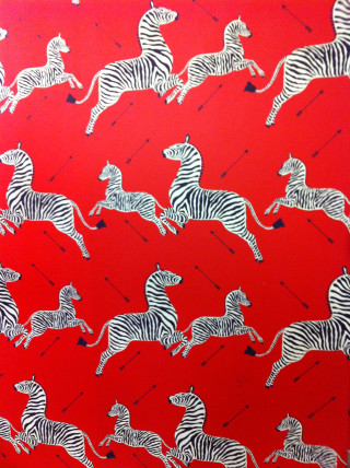 Red background zebras pattern side - free animals wallpaper