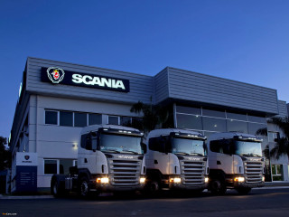Three trucks building logo lights - bernard accama free wallpaper