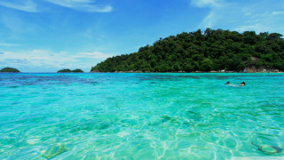 Swimming ocean small island blue - a small island in the background free wallpaper