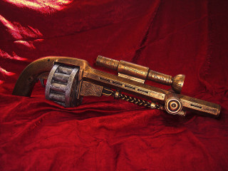 Gold gun metal barrel red - steampunk free wallpaper
