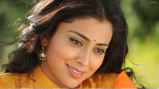 Woman yellow shirt earrings smile - ella guru free wallpaper