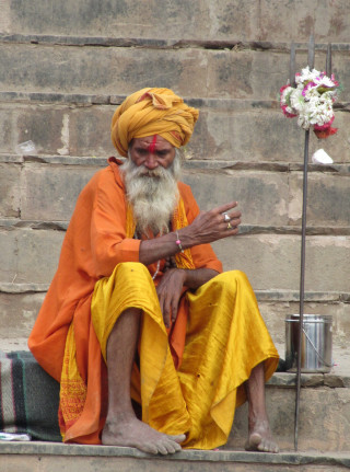 Man beard sitting steps flower - a statue free wallpaper