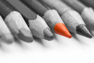 Row of pencils with red - a row free wallpaper