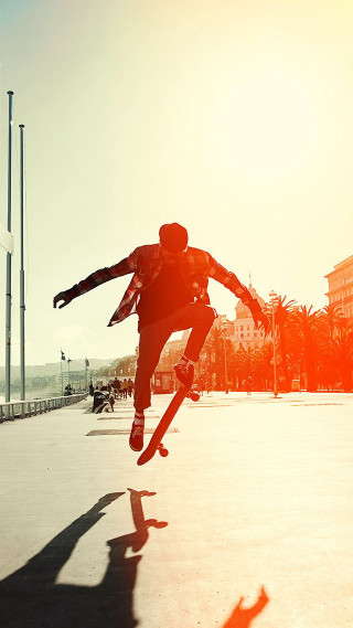 Man skateboard trick air arms - video art free wallpaper