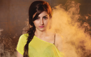 Woman yellow shirt smoke black - smoke behind her free wallpaper