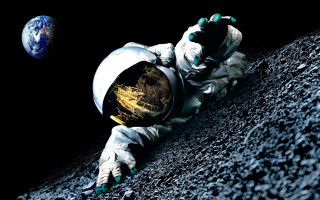 Astronaut laying moon planet black - an astronaut free wallpaper