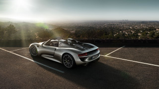 Silver sports car backlit city - the horizon behind free wallpaper