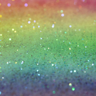 Multicolored glitter dots blurry background - holography free wallpaper