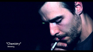 Man smoking cigarette dark background 2 - still free wallpaper