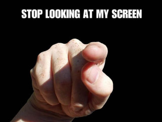 Hand holding fist stop looking - optical free wallpaper