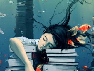 Woman laying books fish head - a stack of books free wallpaper