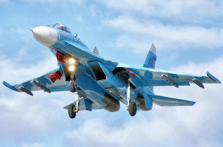 Fighter jet cloudy sky lights - a cloudy blue sky free wallpaper