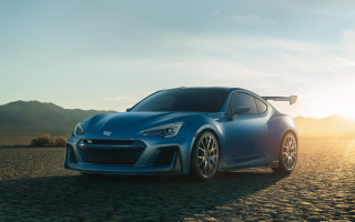 Blue sports car desert mountains 3 - a dirt road in the desert free wallpaper