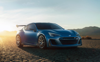 Blue sports car desert sunset - a desert area free wallpaper