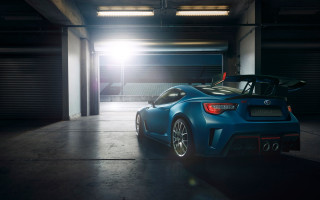 Blue sports car parking garage 7 - the light free wallpaper