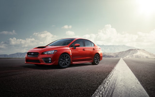 Red car desert mountains sun - a red car free wallpaper
