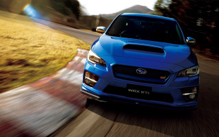 Blue subaru driving road grass - a sky background free wallpaper for desktop