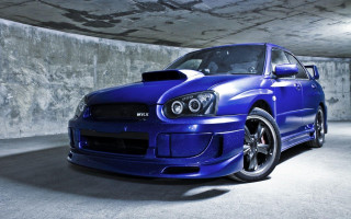 Blue car parking garage concrete 2 - a concrete floor free wallpaper