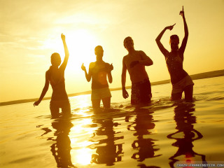 Group people water sunset sunrise - a surfboard free wallpaper