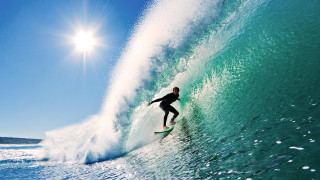 Surfboard riding ocean wave sunshine - a surfboard free wallpaper