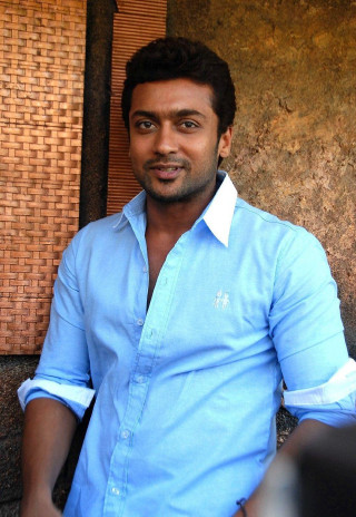 Man blue shirt brick wall - a brick wall behind free wallpaper