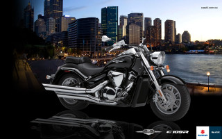 Motorcycle city skyline night reflection - a reflection free wallpaper