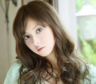 Woman long hair green shirt 7 - free portrait wallpaper