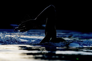 Person swimming water feet arms - their foot free wallpaper