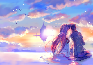 Romantic snowy sunset couple building - a couple sitting free wallpaper