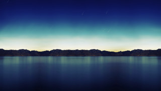 Large body water mountains night - a large body of water free wallpaper