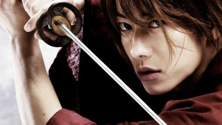 Woman holding sword serious look - her face and shoulder free wallpaper