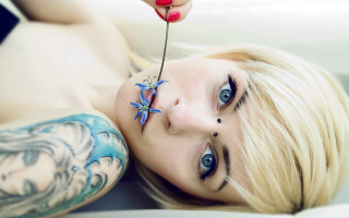 Woman flower nose tattoo arm - a flower free wallpaper
