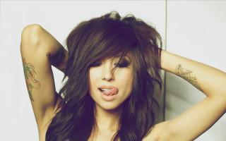 Tattooed woman pose purple hair - her hand behind her head free wallpaper