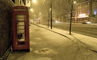 Telephone booth snowy street night - a snowy street free wallpaper