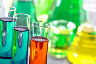 Colorful glasses filled liquid table - synchromism free wallpaper