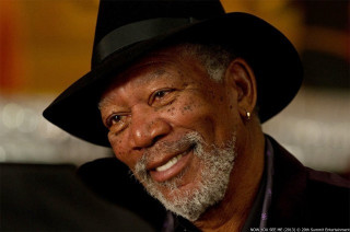 Man hat suit smiling camera - bruce onobrakpeya free wallpaper