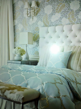 Bed blue comforter white headboard - feature free wallpaper