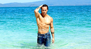 Man ocean shirtless arm raised - his shirt free wallpaper