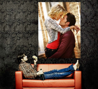 Man woman couch kissing picture - a man and woman free wallpaper
