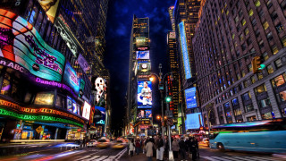 Night city street neon traffic - a busy city street free wallpaper