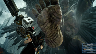 Person holding camera giant creature - a camera in front free wallpaper