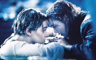 Couple kissing in the snow - movie scene free wallpaper