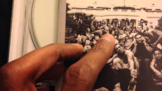 Hand holding picture group men - a polaroid photo free wallpaper